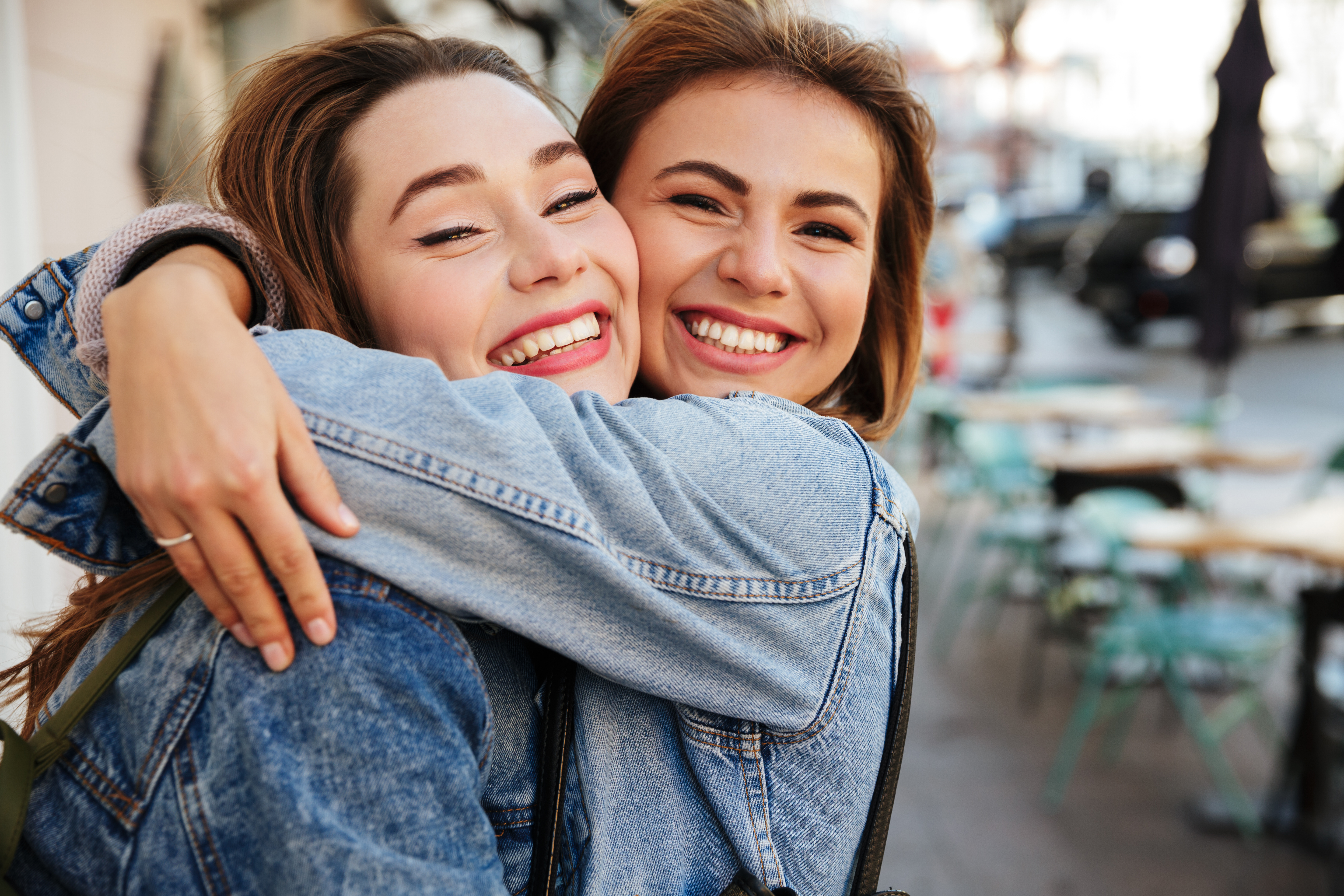 friends hugging each other after setting boundries